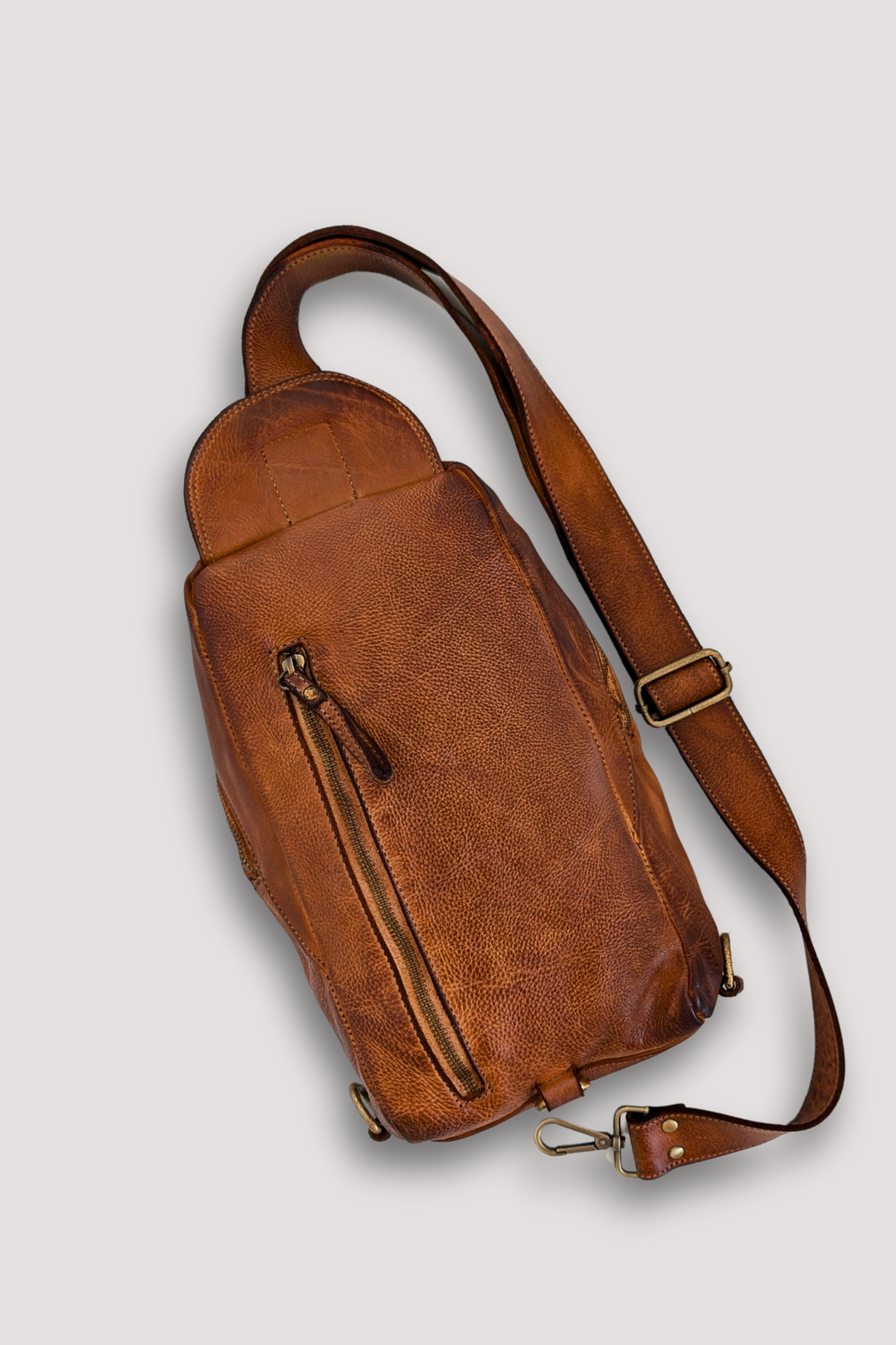 Movement Sling Bag - Cognac Rocks