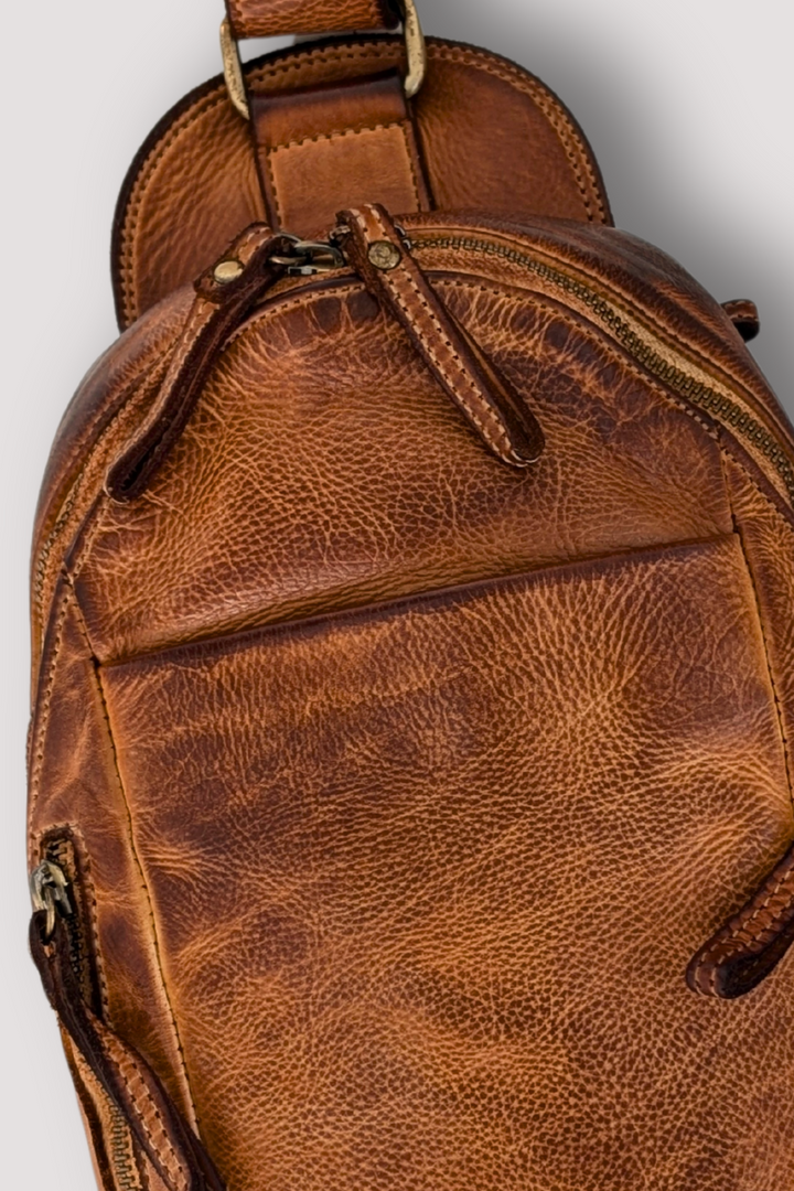 Movement Sling Bag - Cognac Rocks