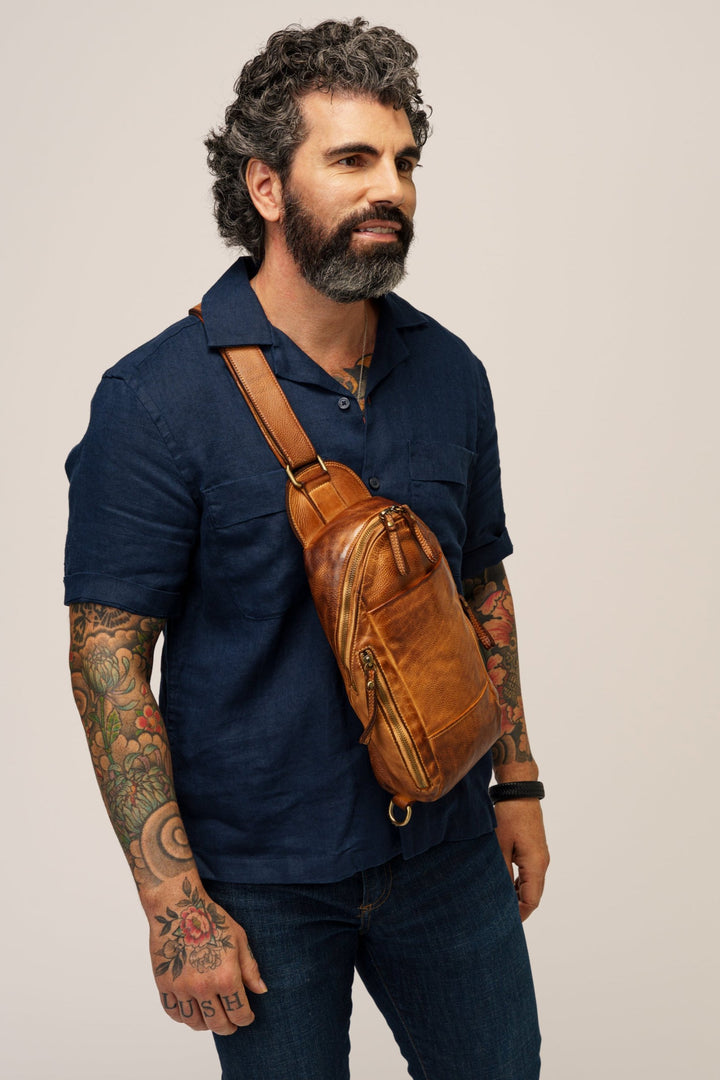 mens cognac leather crossbody sling bag, mens leather chest bag, mens leather phone bag, mens travel bags. mens designer crossbody sling bags. large mens sling bags